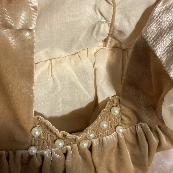 It’s not from Petit Maison Kids, romper 12-18 months.